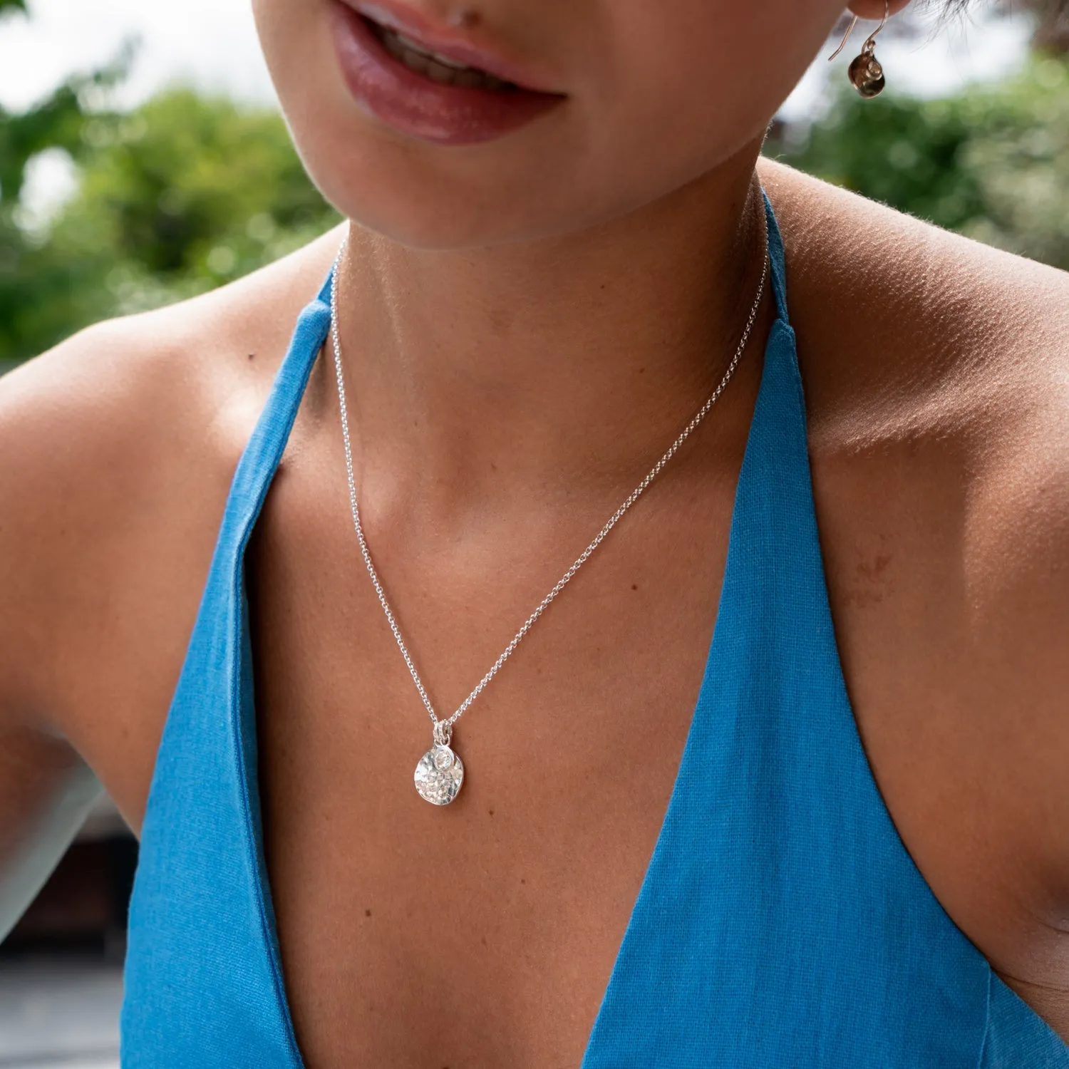 Hammered Disc & 5mm White Topaz Array Pendant