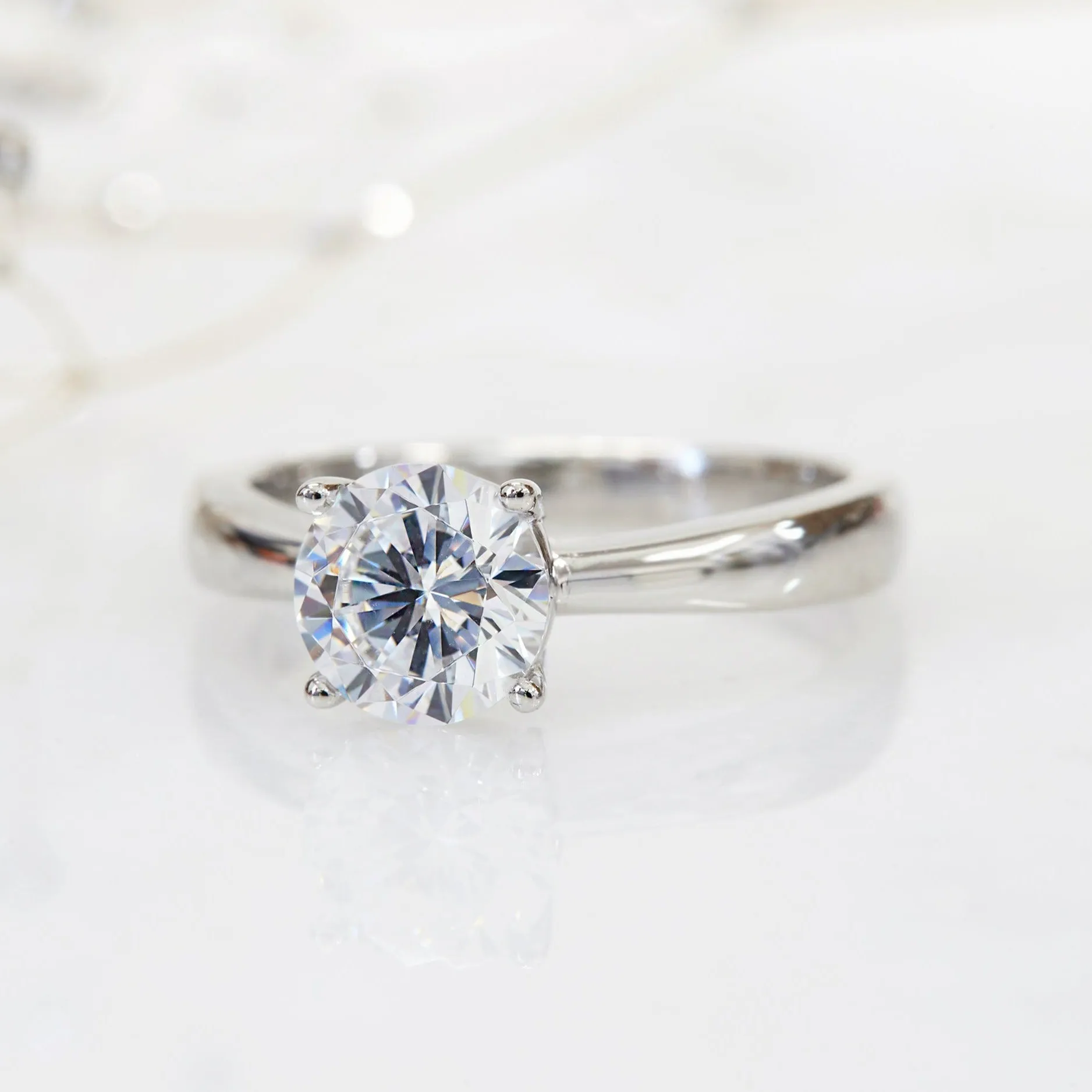 Lustrous Tapered Solitaire Ring. 1.2 CT