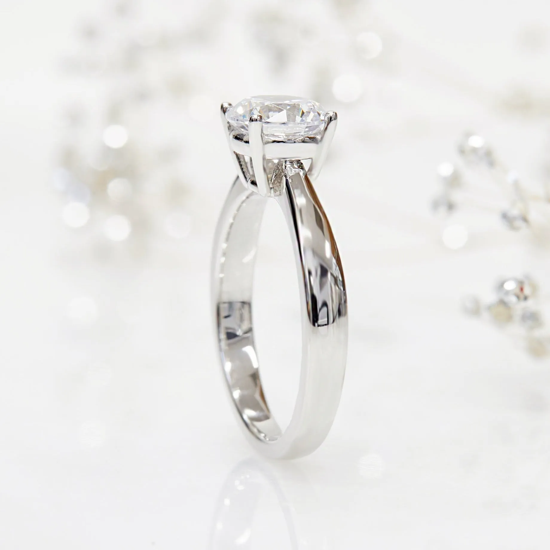 Lustrous Tapered Solitaire Ring. 1.2 CT