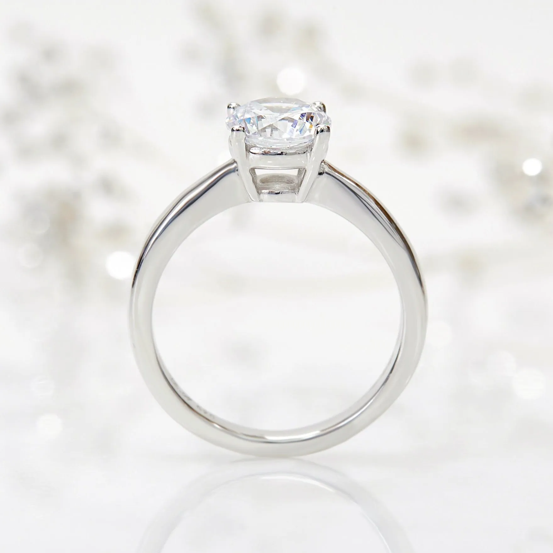 Lustrous Tapered Solitaire Ring. 1.2 CT