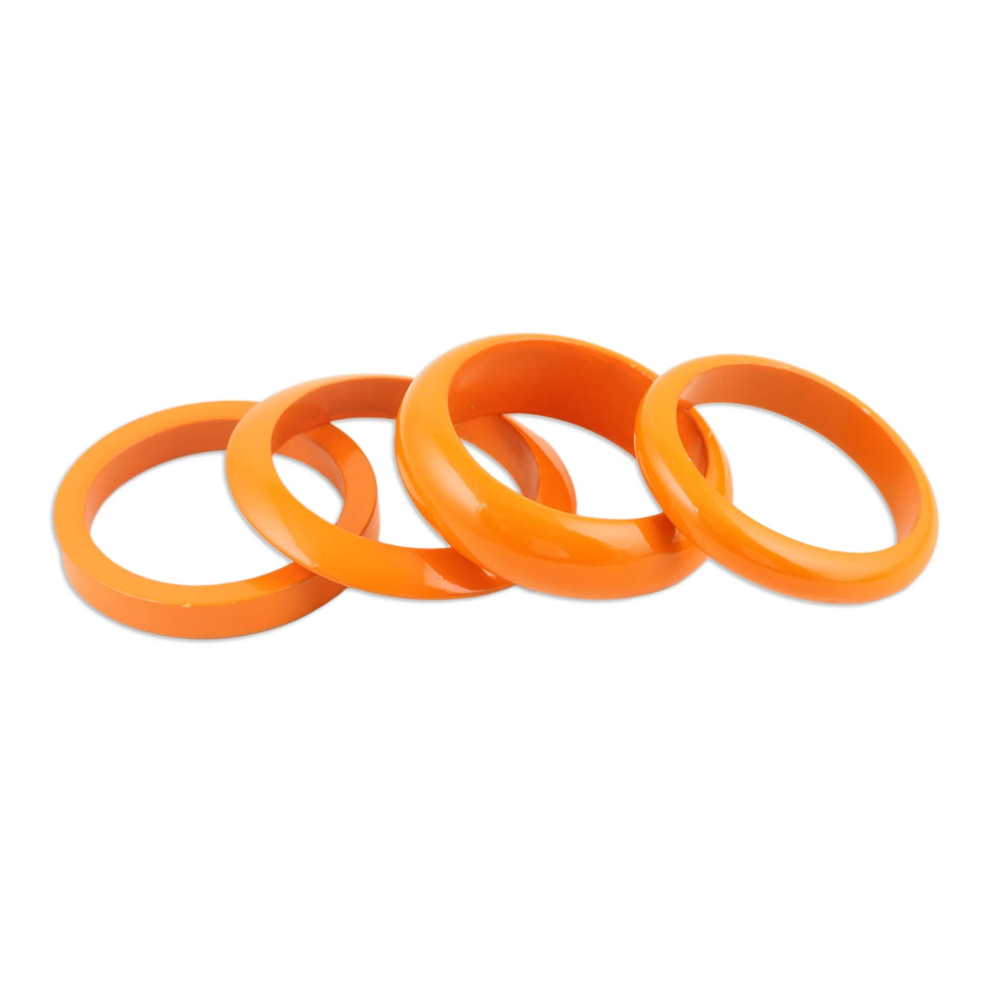 Set of 4 Mango Wood Orange Bangle Bracelets from India - Orange Fusion | NOVICA