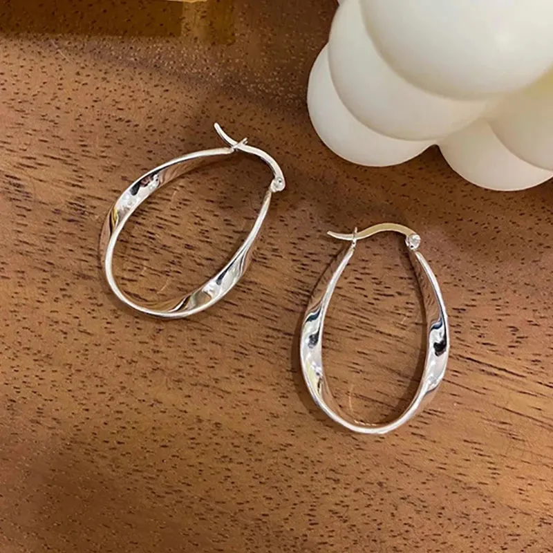 VAIGE Modern Silver Twist Hoop Earrings in Irregular Geometric Design